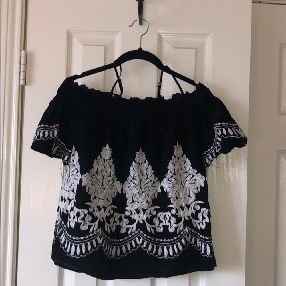 Black top with white embroidery